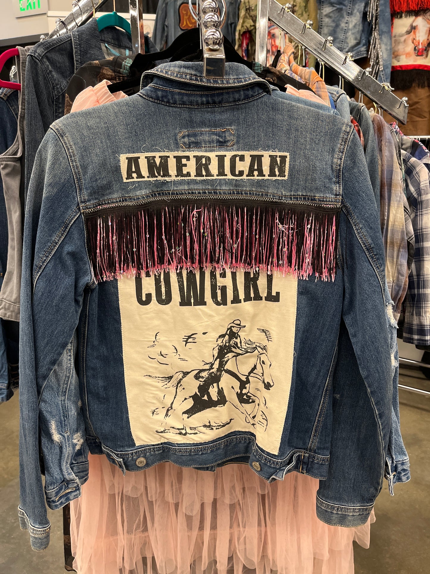 American Cowgirl with black and pink fringe