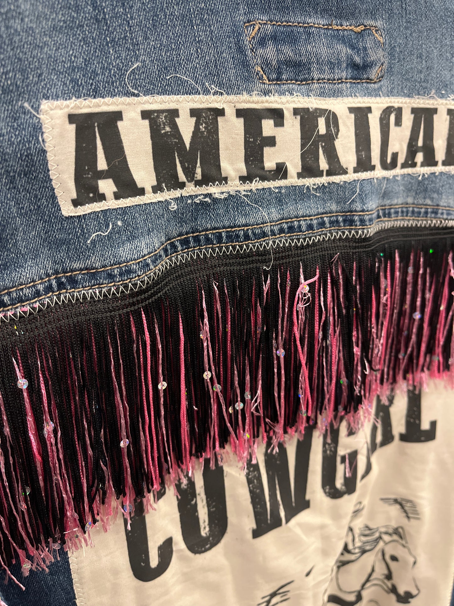 American Cowgirl with black and pink fringe