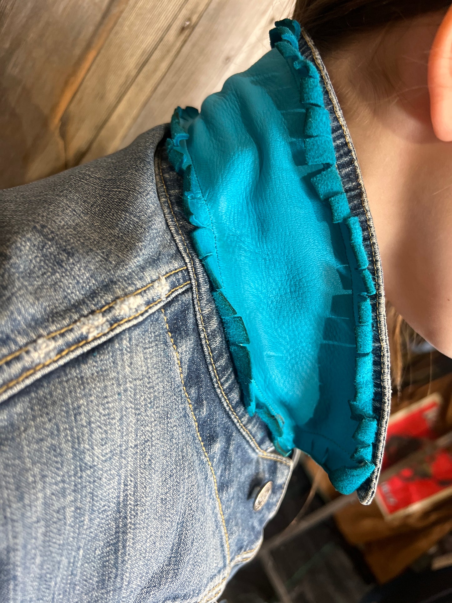 Jean jacket with leather collar