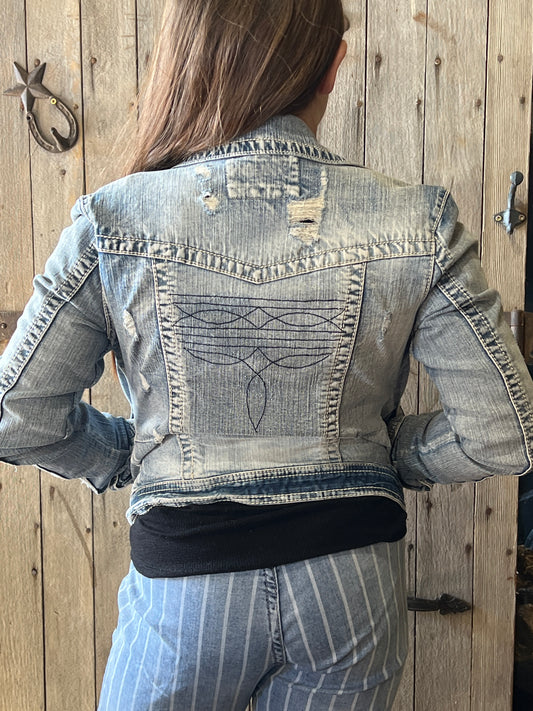 Jean jacket with boot stitch on back