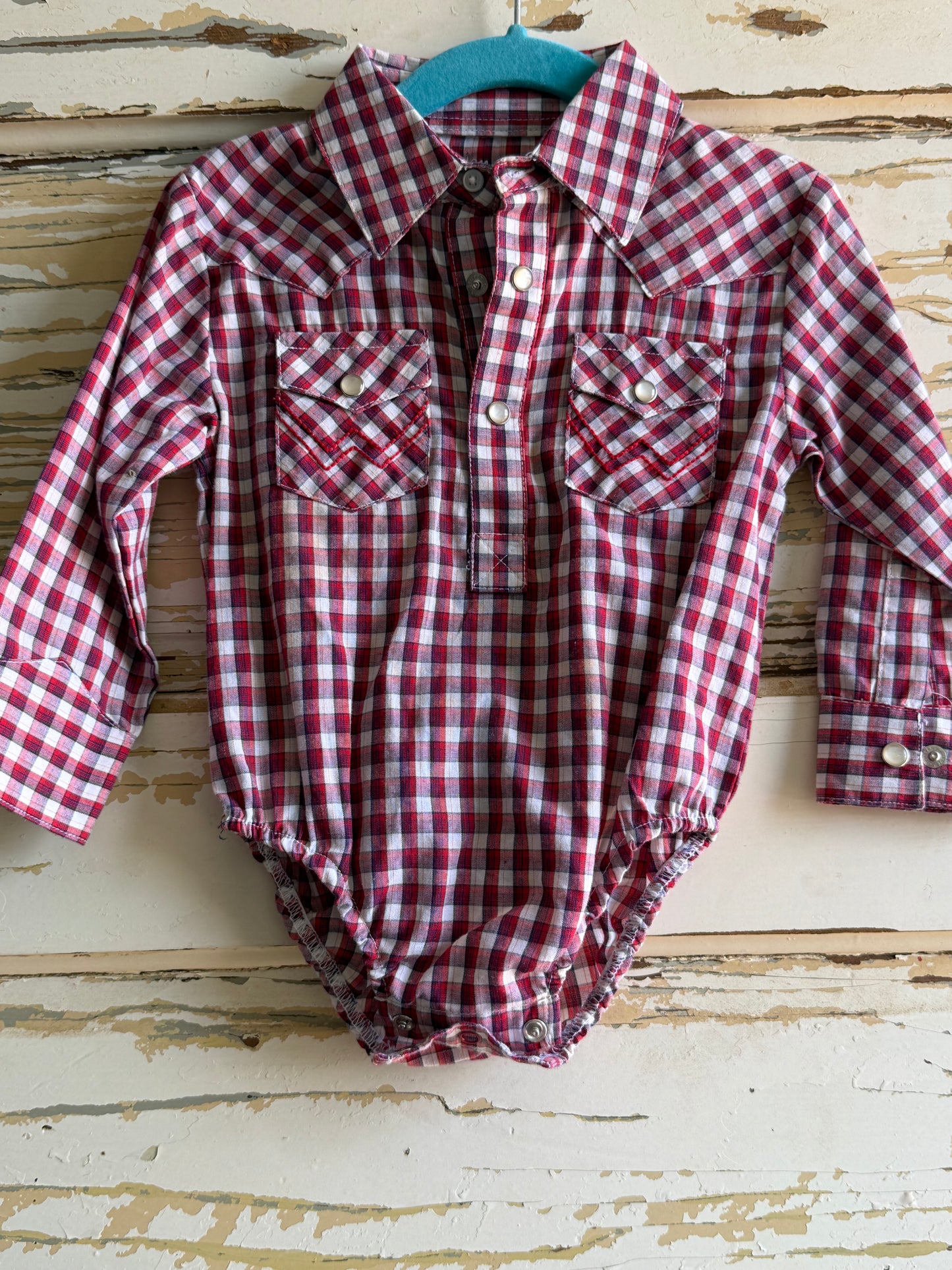 Bucked Off Wrangler Snap Onesie